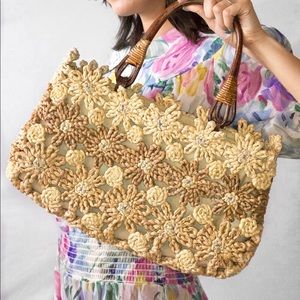 Straw flower purse with rattan handle